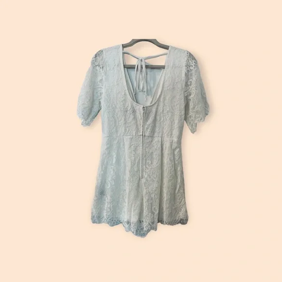 Trixxi Clothing Co | lace romper size M with tie and zipper in back - Picture 2 of 8